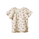 White based short sleeved tee with red cherry print and flutter sleeves - front view
