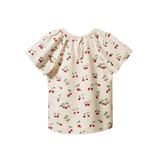 White based short sleeved tee with red cherry print and flutter sleeves - back view
