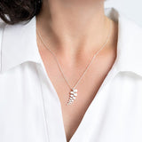 Silver Necklace with NZ Button Fern Pendant on Model