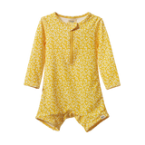 Nature Baby One Piece Bathing Trunks in Kitchen Garden Freesia Print Design at Cerise.  