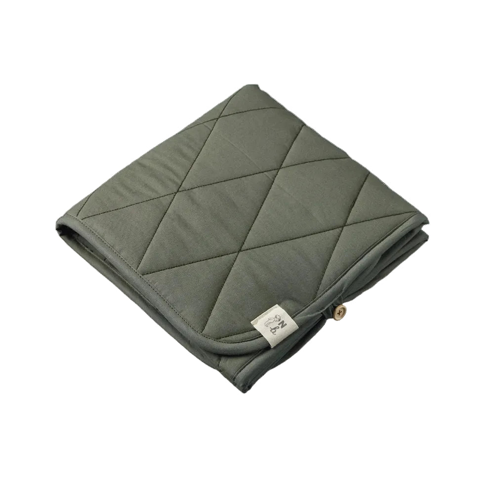 Nature Baby Quilted Change Mat at Cerise.  Shown here in Thyme colour and folds away neatly for storage.