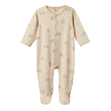 Nature Baby Stretch & Grow nsuit with easy snap domes and fully enclosed feet. Shown in ramble Burrow print in earthy tones.