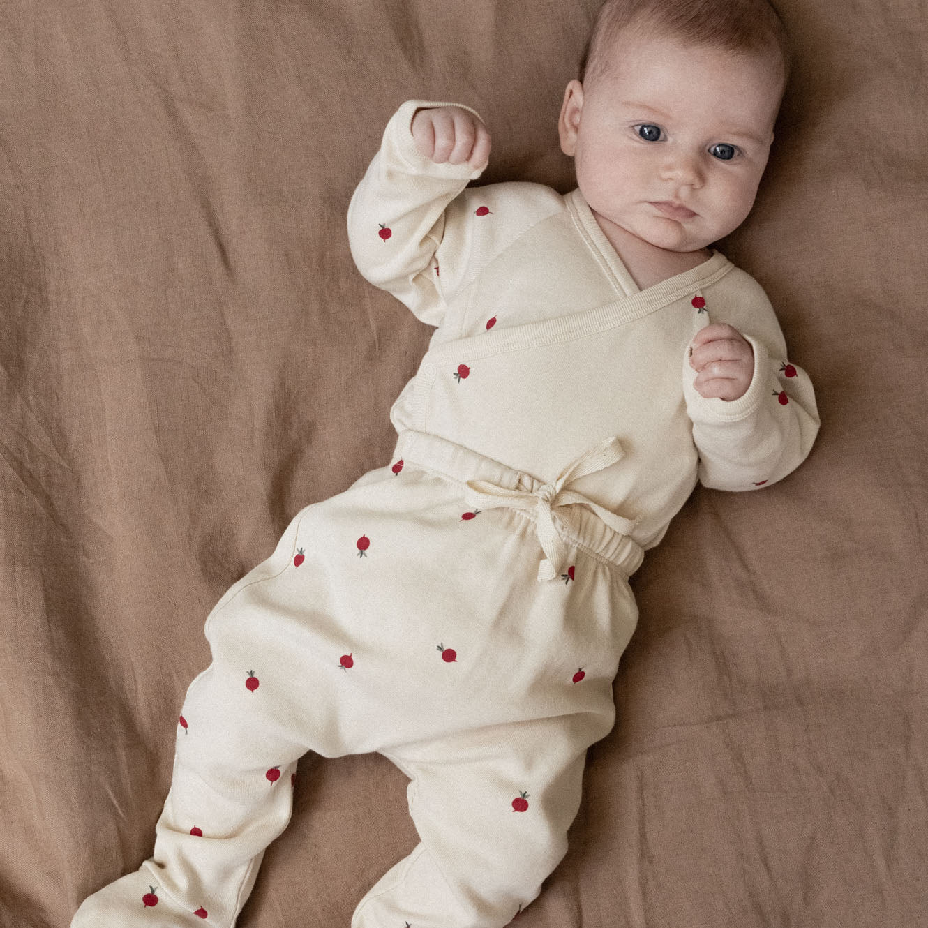 Nature Baby Long Sleeved Kimono Bodysuit and footed rompers in radish print at Cerise