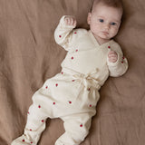 Nature Baby Long Sleeved Kimono Bodysuit and footed rompers in radish print at Cerise
