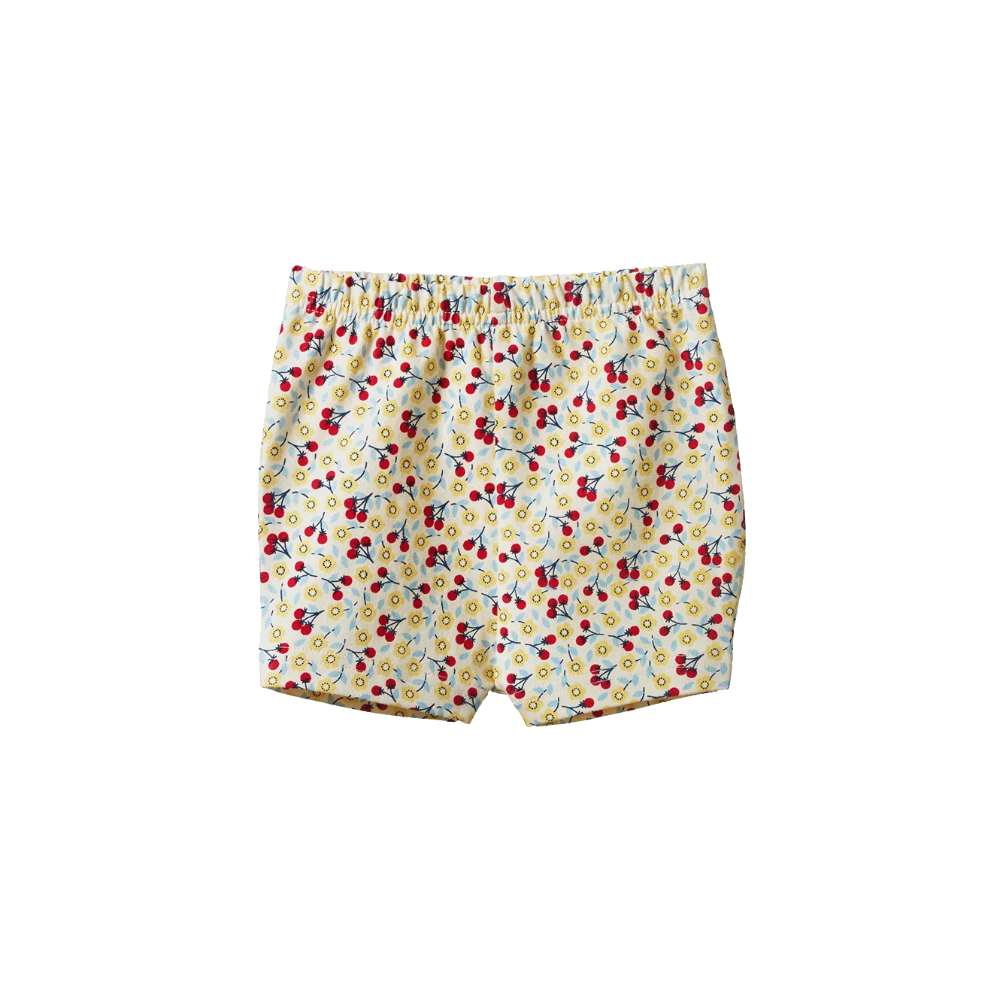 Nature Baby Selby Shorts in Kitchen Garden Print at Cerise. ade from 100% cotton with elasticated waist.