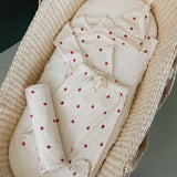 Nature Baby Welcome Home Bundle in Raspberry ptint at Cerise.  Comes in a drawstring bag and includes a 100% cotton long sleeve bodysuit, hat, footed rompers and wrap for new baby in sizes prem, newborn and 0-3 months.