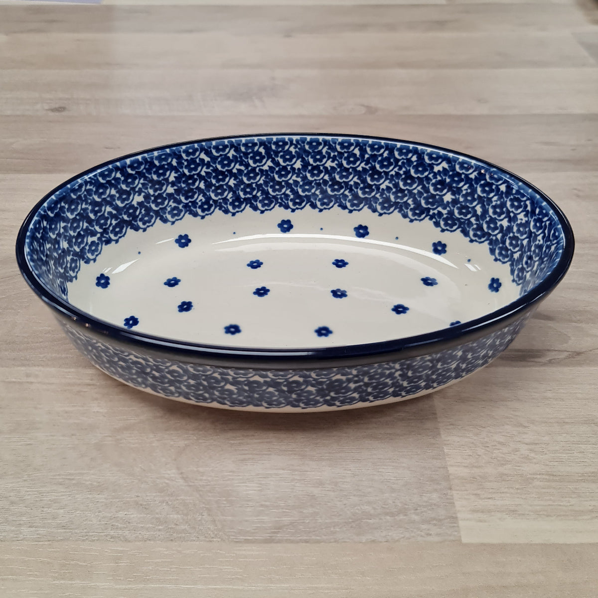 Blue and white oval shaped pottery baker