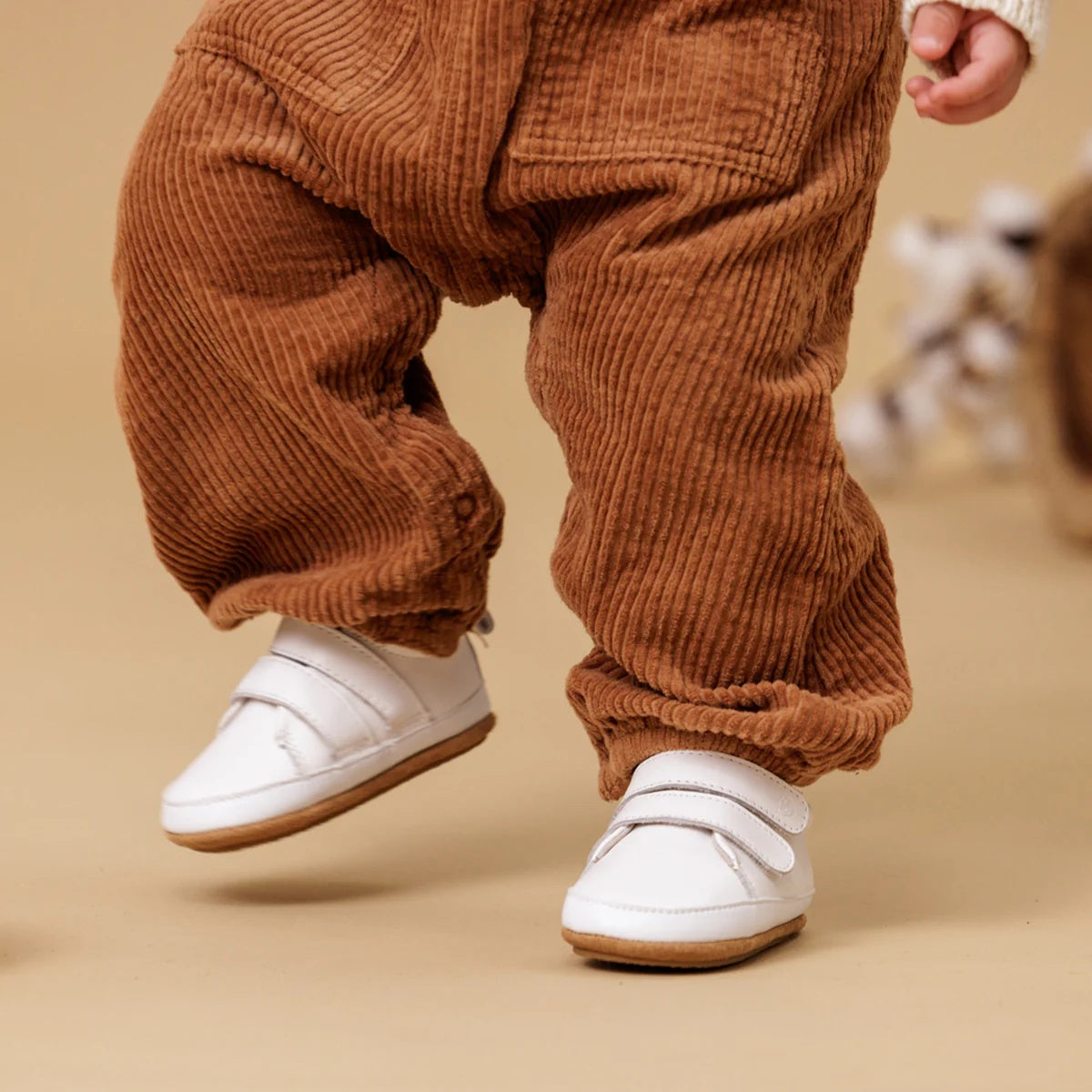 Pretty brave scout baby shoes in white colour at Cerise for baby and toddler.  Feature velcro straps for easy on and off, soft non slip sole, made from leather.