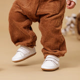 Pretty brave scout baby shoes in white colour at Cerise for baby and toddler.  Feature velcro straps for easy on and off, soft non slip sole, made from leather.