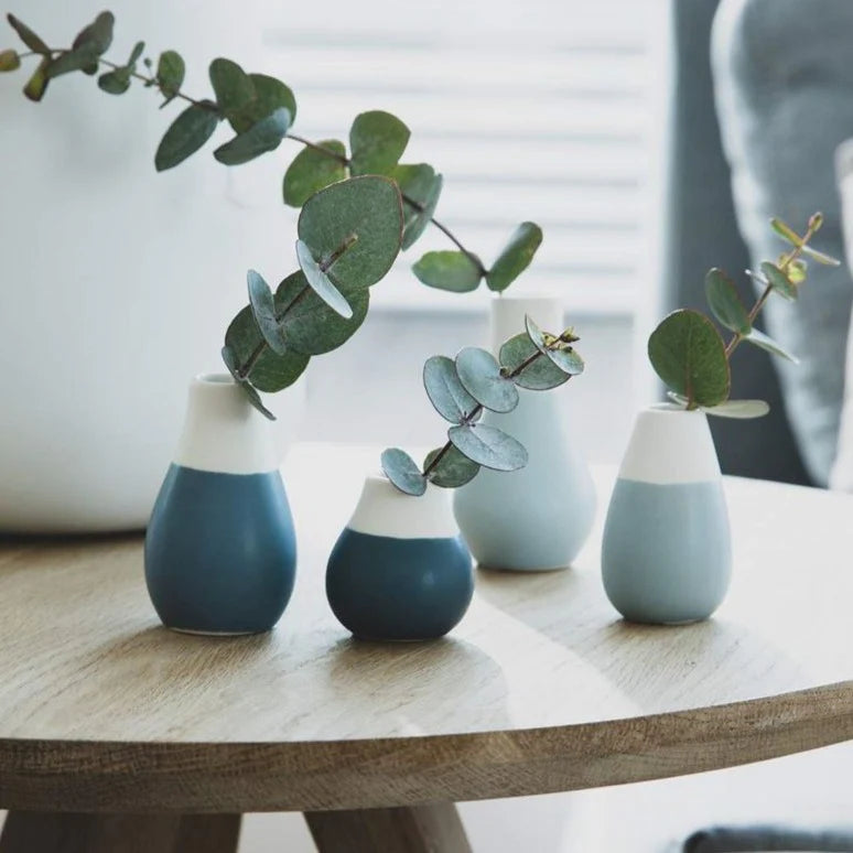 Set of 4 petite pastel blue mini porcelain vases