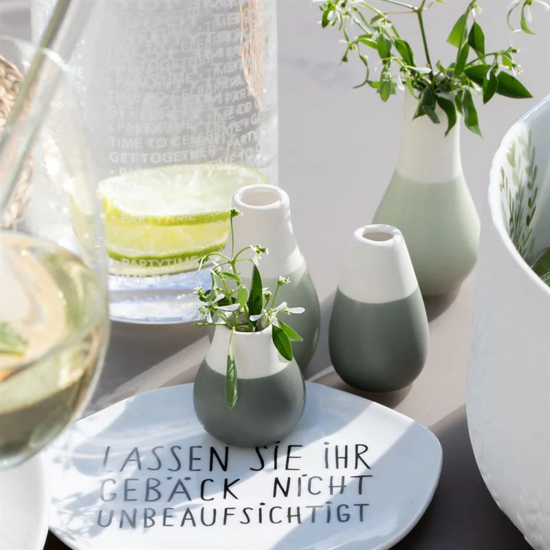 Set of 4 petite pastel green mini porcelain vases