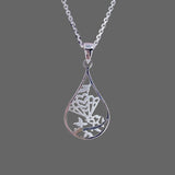 Silver Necklace featuring a teardrop pendant  with a stencilled piwakawaka - NZ Fantail design