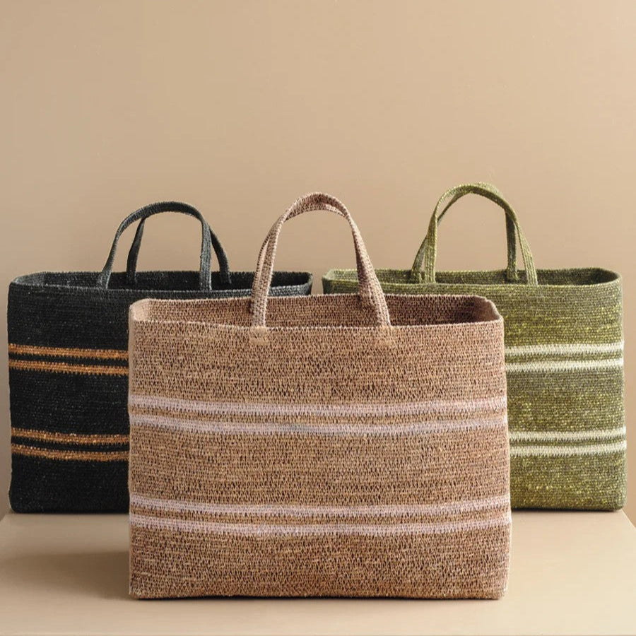 Three woven seagrass baskets