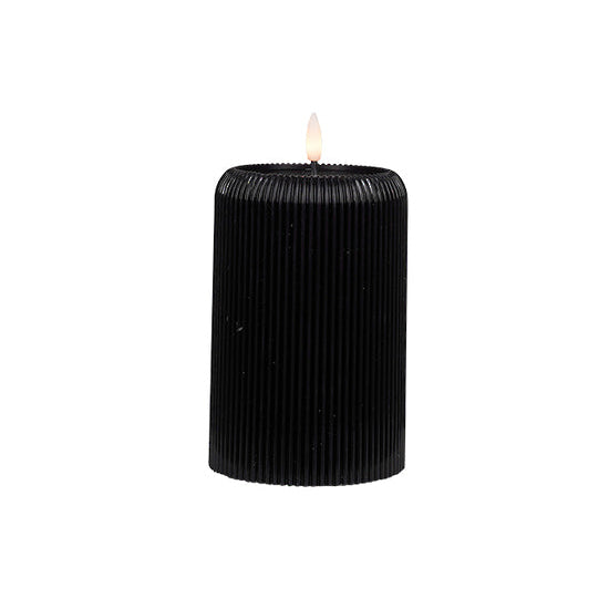 Small black wax ribbed candle with LED Flame