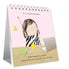 Desk calendar with illustration of a person at a desk and humorous text on a pink background