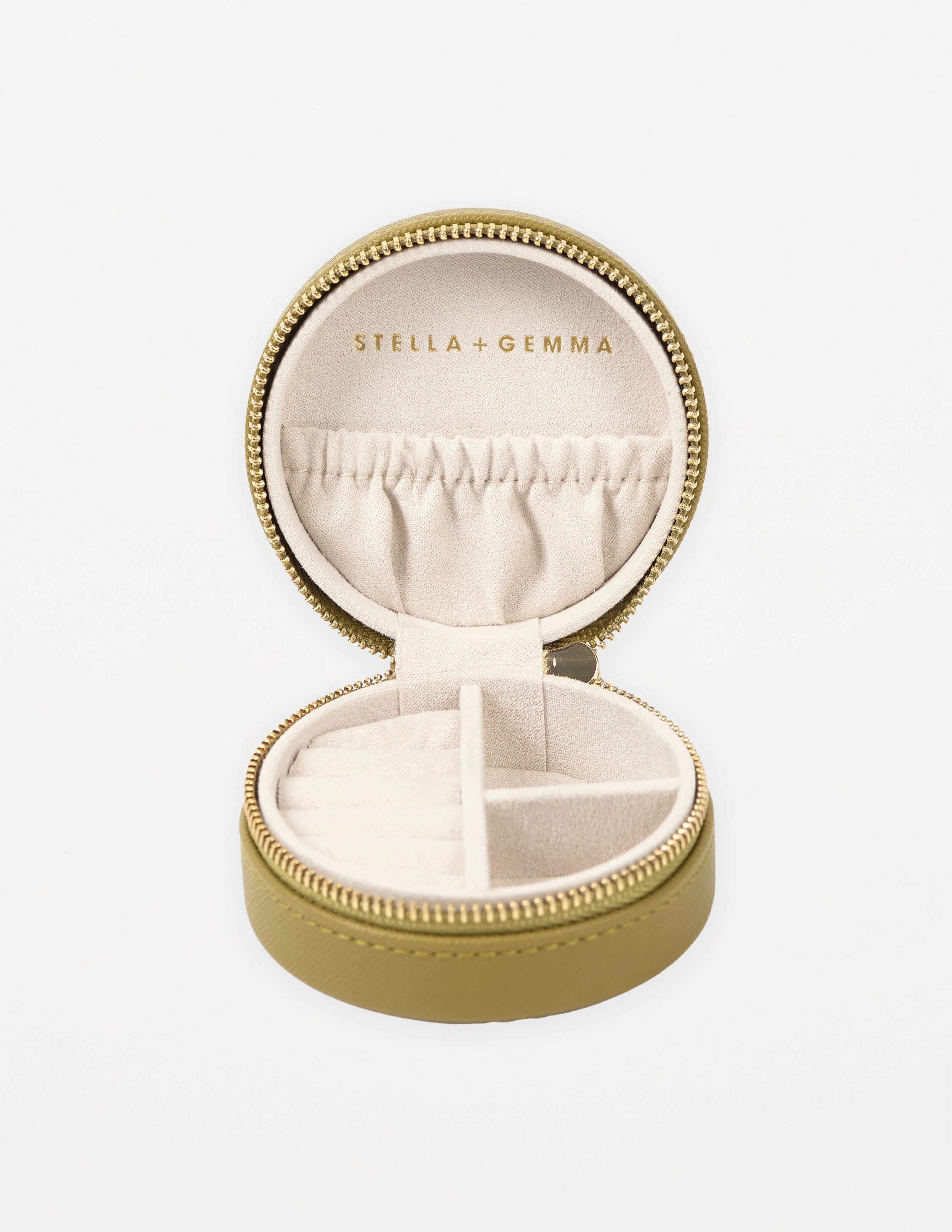 Khaki Coloured round  Jewel Box with gold zip - Inside photo showing places for your jewels and Stella & gemma branded logo.