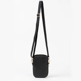 Black crossbody bag with a strap on a white background