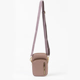 Small rose crossbody bag with a strap on a white background