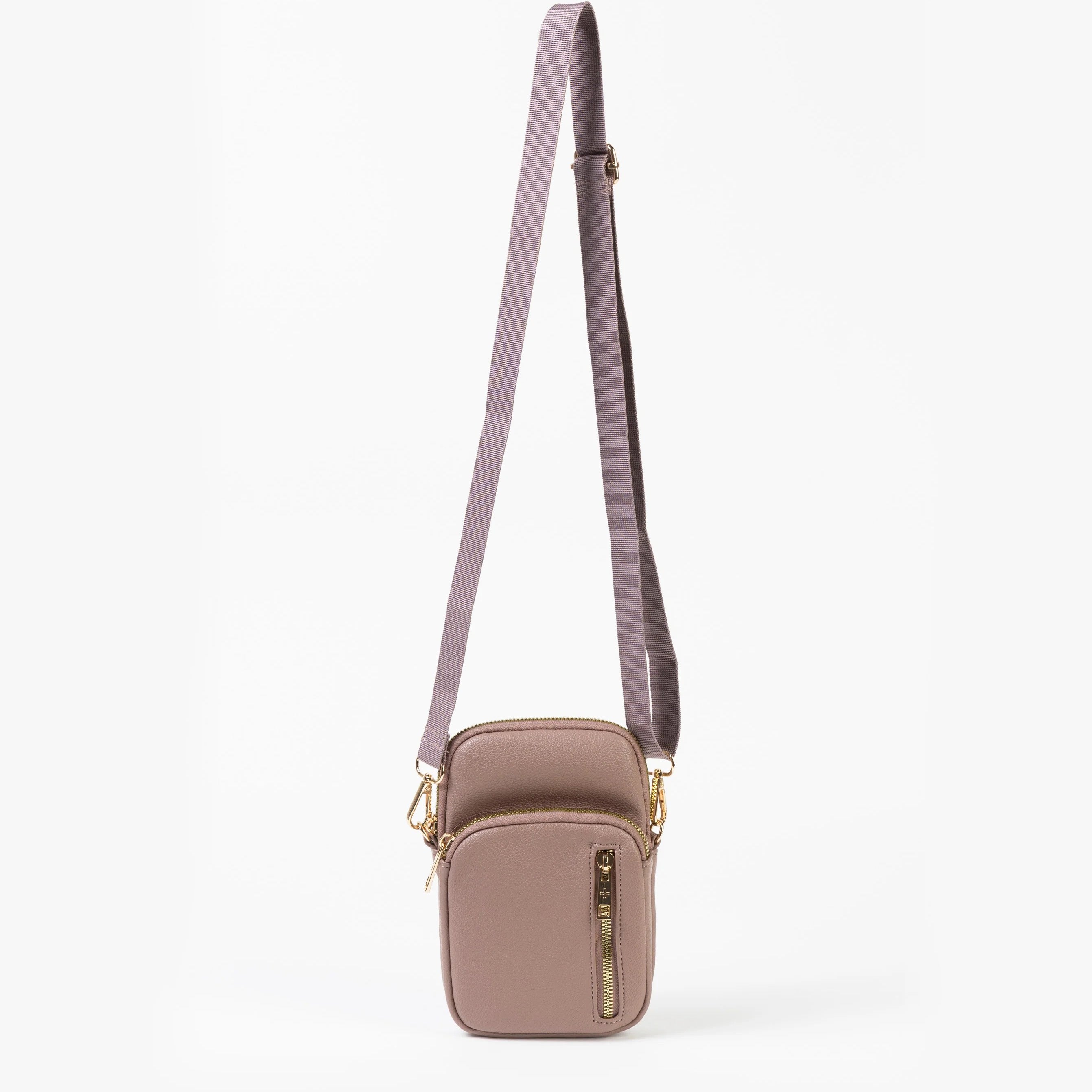 Small rose crossbody bag with a strap on a white background