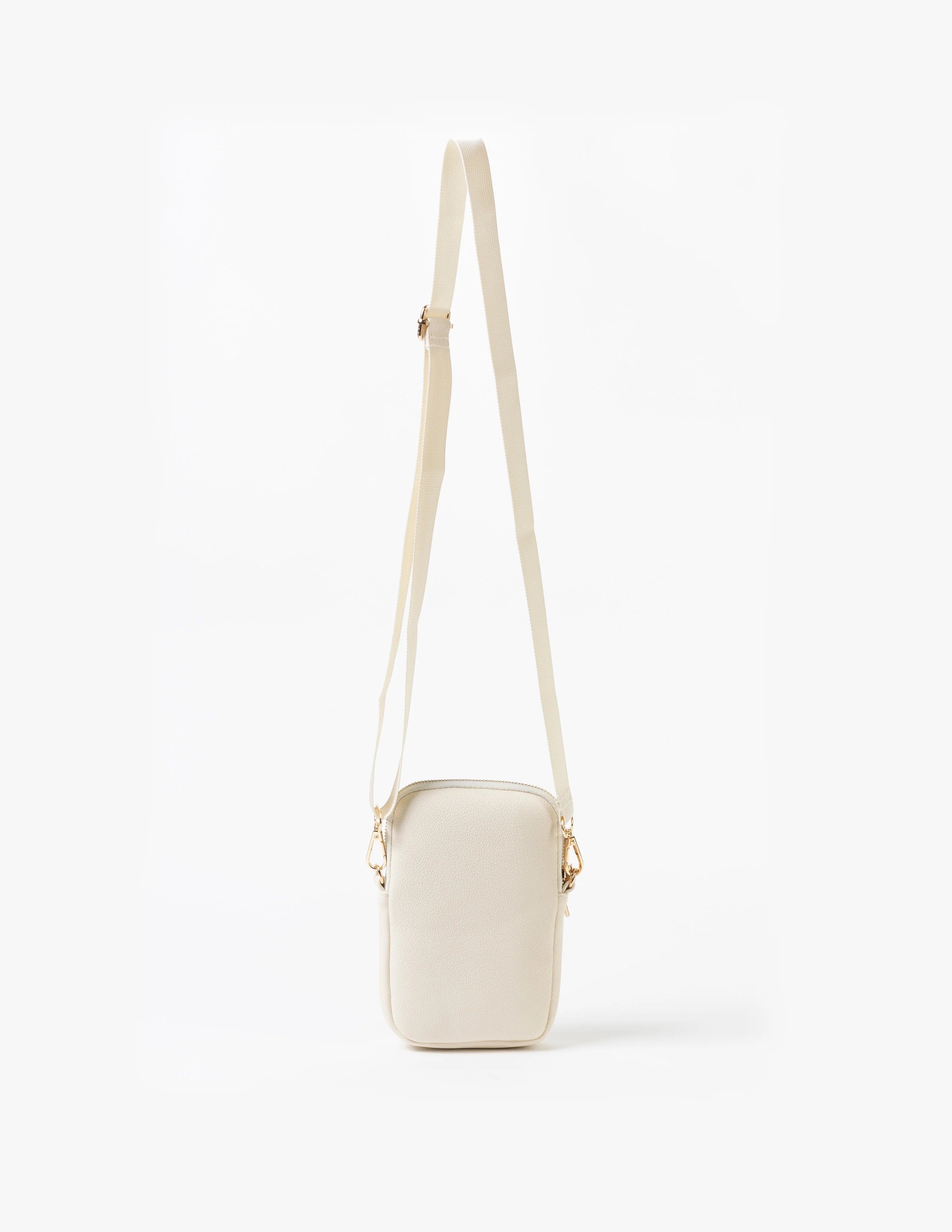 White crossbody bag on a white background