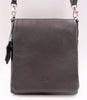 Black leather crossbody bag on a white background