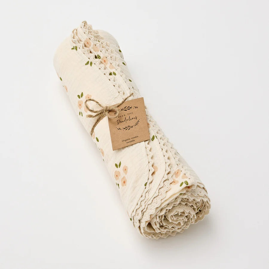 A beautiful organic muslin swaddle blanket and newborn essential from Over the Dandelions at Cerise Giftware.   Measures 120cm x 120cm, shown here in Daisy Print Design.