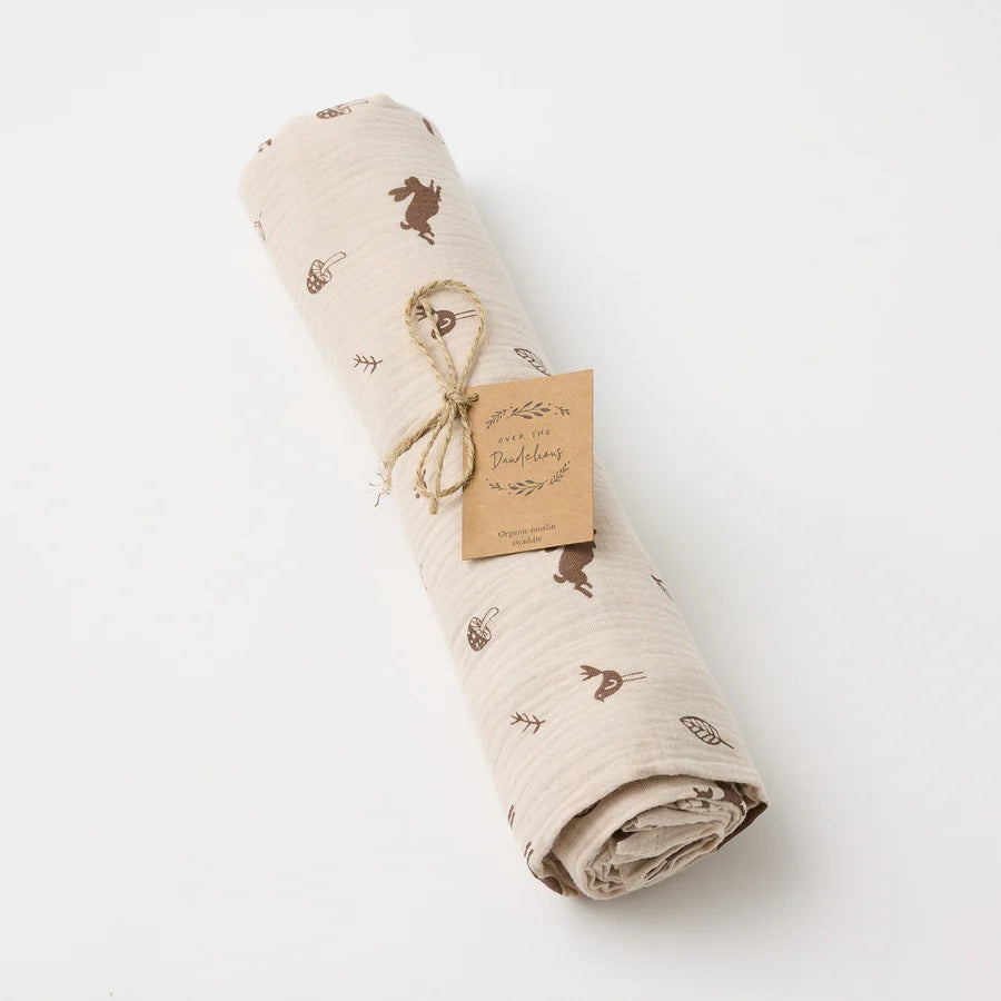 A beautiful organic muslin swaddle blanket and newborn essential from Over the Dandelions at Cerise Giftware.   Measures 120cm x 120cm, shown here in Woodlands design.