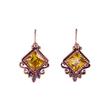 Simply Italian Earrings freaturing a large genuine Bright Citrine Swarovski crystal centre stone with  three sparkling fumé Swarovski crystal accents.  Intricate Baroque-inspired design made from 18ct rose gold plate over 925 sterling silver
Size: 18mm wide × 32mm high (including hook)
Hook-style earrings
Made in Italy at Cerise