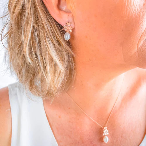 Simply Italian Cultured Freshwater Pearl  and Flower Pendant at Cerise.  Made from Sterling Silver with 18K rose gold plating and a delicate cultured freshwater pearl, pendant Includes 40cm chain and comes gift boxed.