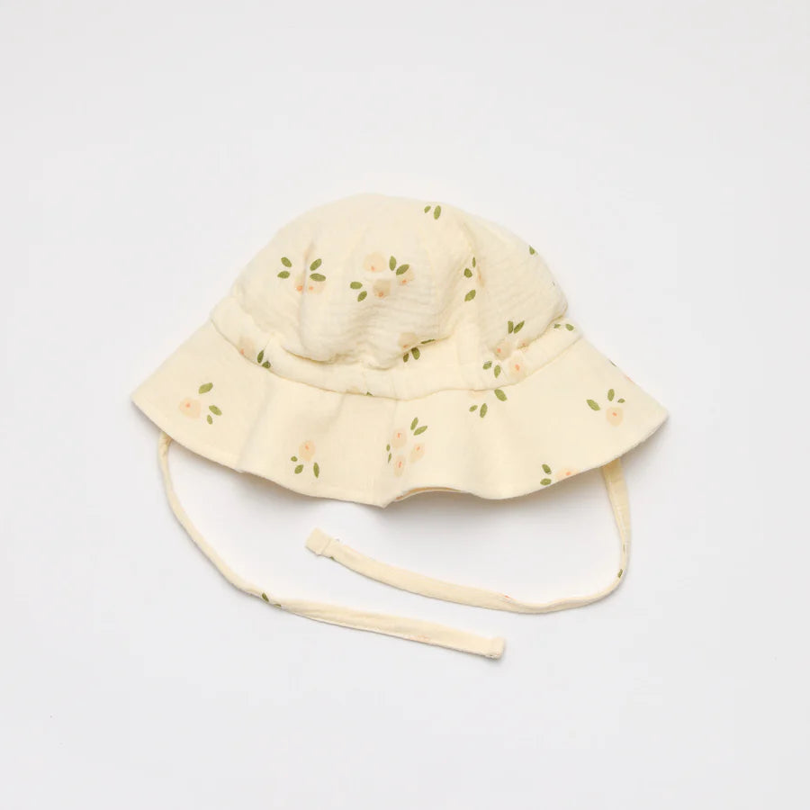Natural colour baby sunhat with pink and green floral pattern