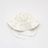 Natural coloured sunhat with small blue print pattern