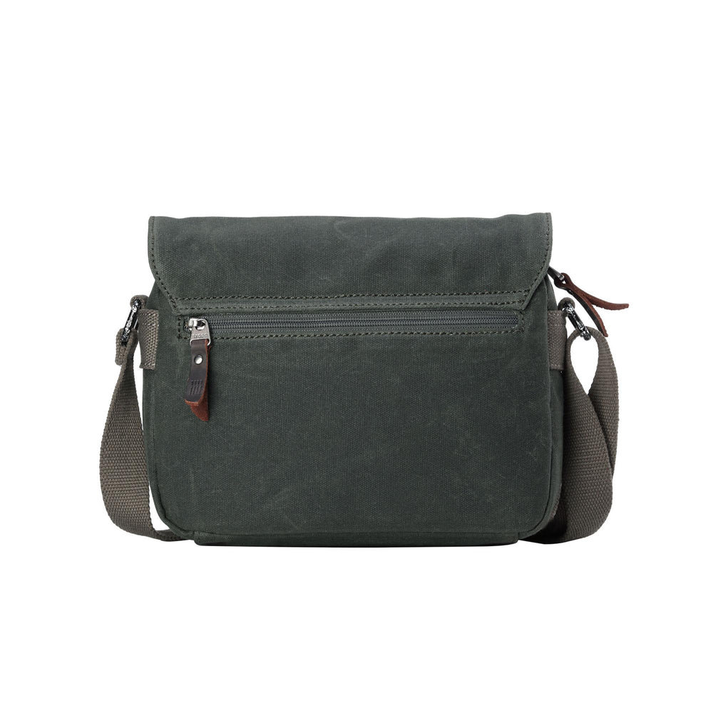 Troop London Nomad 440 Cross Body Bag at Cerise. Fully lined small travel bag with deep compartments, zip closure and phone compartment. Zip enclosure on back of bag. Measures H21 x W26 x D10cm. Made of waxed canvas, shown here in dark green.