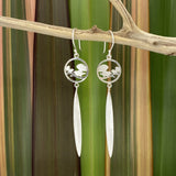 Silver Earrings with two NZ native fantail birds sitting in a circle and a flax leaf drop
