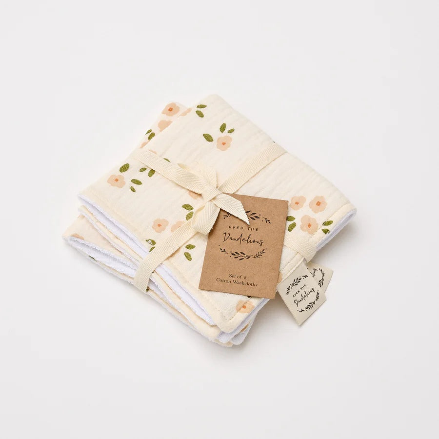Over the Dandelions Set of 2 Baby Wash cloths in Daisy  design at Cerise.  Featuring  a gorgeous soft pink daisy print on a naeutral background. Made from 100% organic cotton muslin and cotton terry.