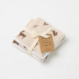 Over the Dandelions Set of 2 Baby Wash cloths in Woodlands design at Cerise.  Featuring  a gorgeous Woodland animal print in brown on a natural base cloth. Made from 100% organic cotton muslin and cotton terry.