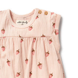Soft pink with strawberry print all in one grow suit with short sleeves - close up of neckline showing shoulder buttons
