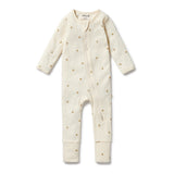 Baby onesie with bee pattern on a white background