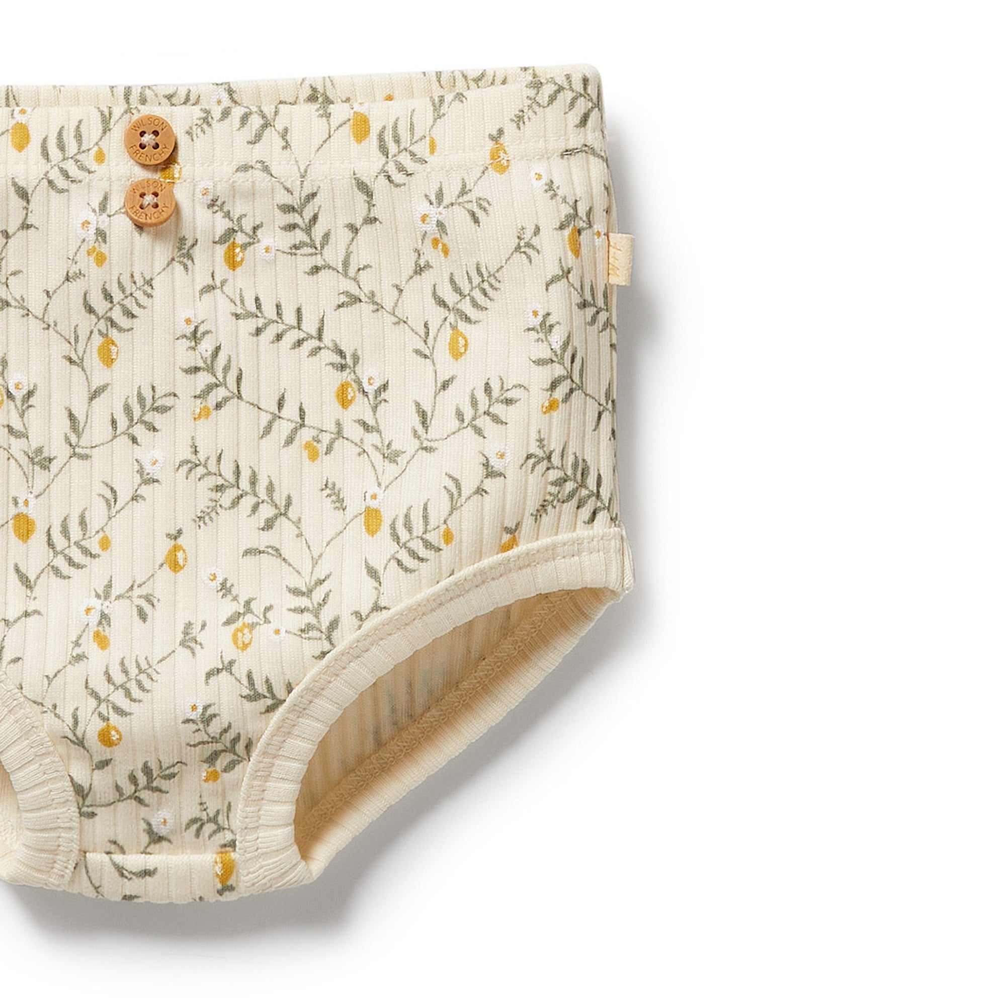 Floral-patterned baby bloomers with buttons on a white background