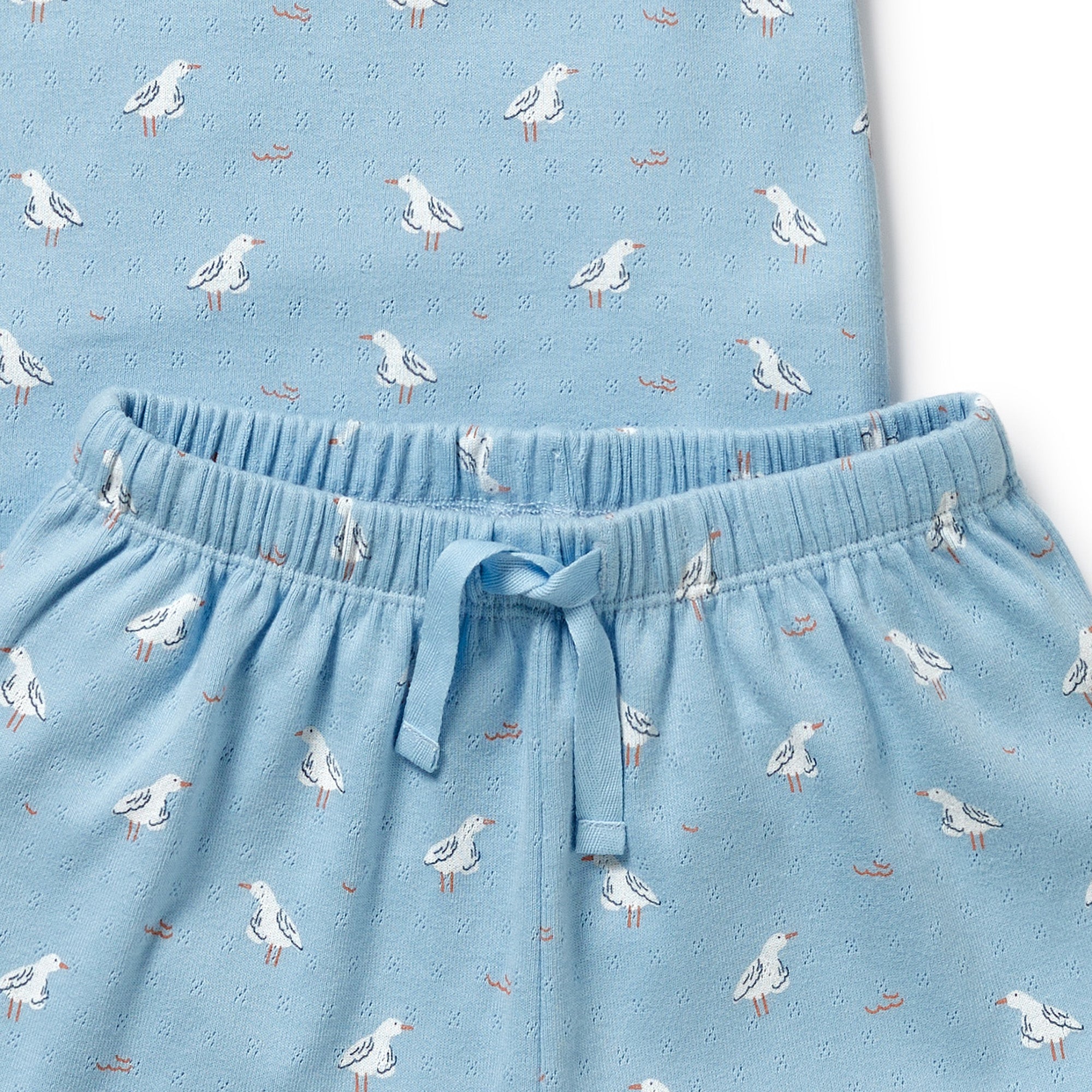 Light blue whit white seagulls close up of pyjama pant elastic waist