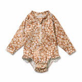 Floral pattern on brown background long sleeved swimsuit or girls