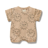 Baby grow suit in caramel colour with brown sun faces. dome crotch and short sleeves with front feature pocket
