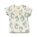 Baby t-shirt with Blue yeti pattern on a natural background  - Front view with button on shoulder