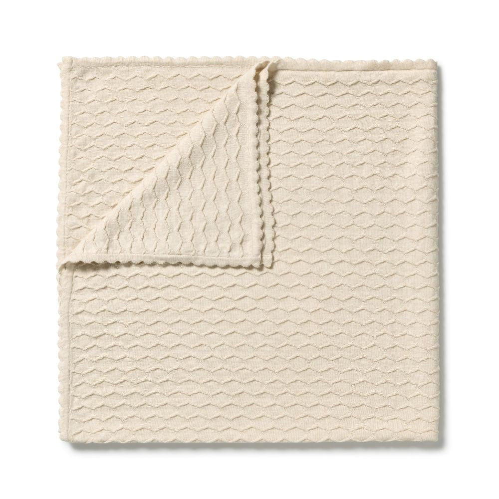 Wilson & Frenchy Milk Cloud Organic Knitted Chevron Blanket at Cerise. Featuring a timeless all-over chevron knit design, the Milk Cloud blanket combines classic style with everyday practicality. Measuring a generous 100 cm x 100 cm, it’s perfectly sized for newborn cuddles, pram strolls, nursery styling and keeping your little one cosy at home or on the go.