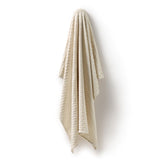 Wilson & Frenchy Milk Cloud Organic Knitted Chevron Blanket at Cerise. Featuring a timeless all-over chevron knit design, the Milk Cloud blanket combines classic style with everyday practicality. Measuring a generous 100 cm x 100 cm, it’s perfectly sized for newborn cuddles, pram strolls, nursery styling and keeping your little one cosy at home or on the go.