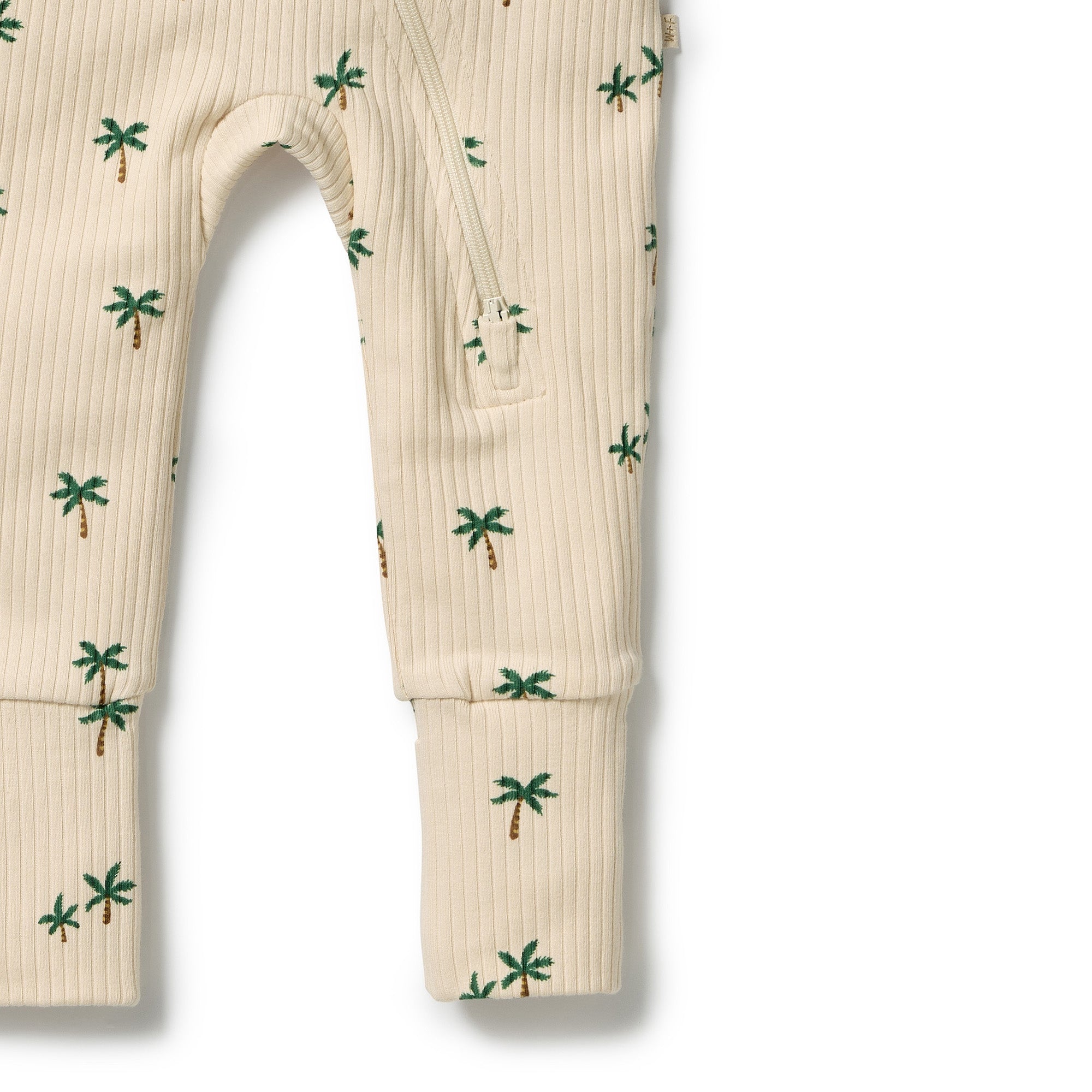 Wilson & frenchy Zipsuit with Feet in Tiny Palm Print at Cerise. This practical footed zipsuit features fold-over mittens (newborn to 000) to protect baby's delicate face, enclosed feet for warmth, and a two-way zip closure for effortless nappy changes.