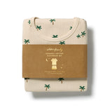 Wilson & frenchy Kids Tiny Palm Organic Shorts Sleeve Pyjamas at Cerise. Made from GOTS-certified organic cotton in a lightweight drop-needle fabric, this two-piece kids’ sleepwear set offers breathable comfort for a restful night’s sleep. The set includes a short-sleeved T-shirt and relaxed, mid-length shorts, making it an easy and practical choice for warmer weather.