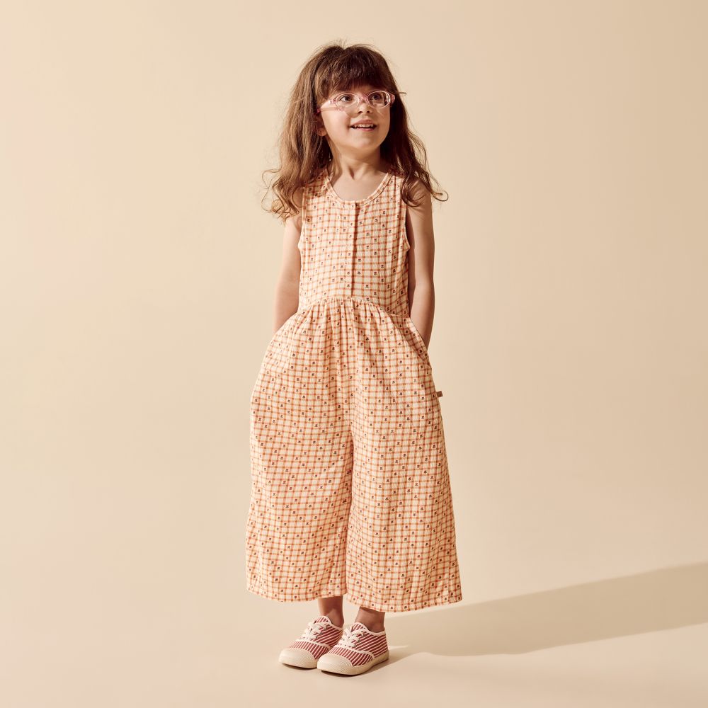 Wilson & Frenchy Organic Crinkle Jumpsuit in Checkerberry Print at Cerise. A practical front snap opening makes getting dressed and changed quick and simple. 