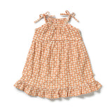 Wilson & Frenchy Checkerberry organic crinkle ruffle dress at Cerise. Designed with a flattering halter neckline, adjustable shoulder ties and a soft ruffle hem, the Checkerberry dress combines effortless style with practical comfort. The loose fit allows plenty of room to move, while the lightweight crinkle fabric feels soft and breathable against the skin 