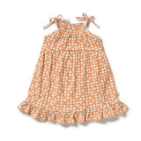 Wilson & Frenchy Checkerberry organic crinkle ruffle dress at Cerise. Designed with a flattering halter neckline, adjustable shoulder ties and a soft ruffle hem, the Checkerberry dress combines effortless style with practical comfort. The loose fit allows plenty of room to move, while the lightweight crinkle fabric feels soft and breathable against the skin 