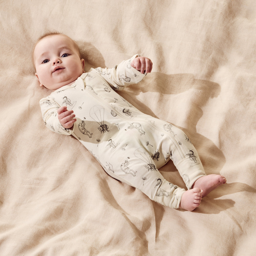Wilson & Frenchy Zipsuit with feet in Whispering Willows Print at Cerise. Round neckline with concealed zipper for safety, Long sleeves with fold-over mittens (newborn to 000), Full length with enclosed feet for warmth, Two-way zip closure for quick and easy changes.